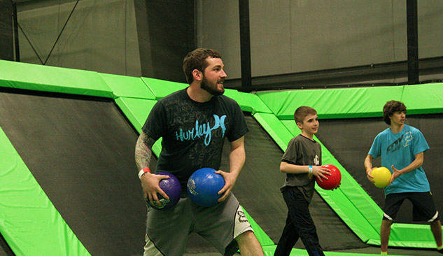 Trampoline dodgeball fun with family teams